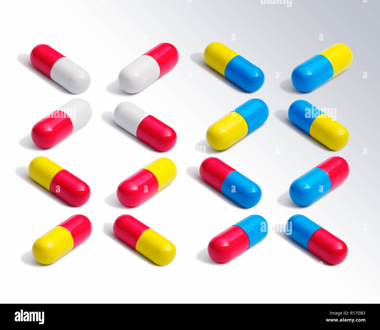 Group of colourful medication pill capsules in regular pattern, still life Stock Photo
