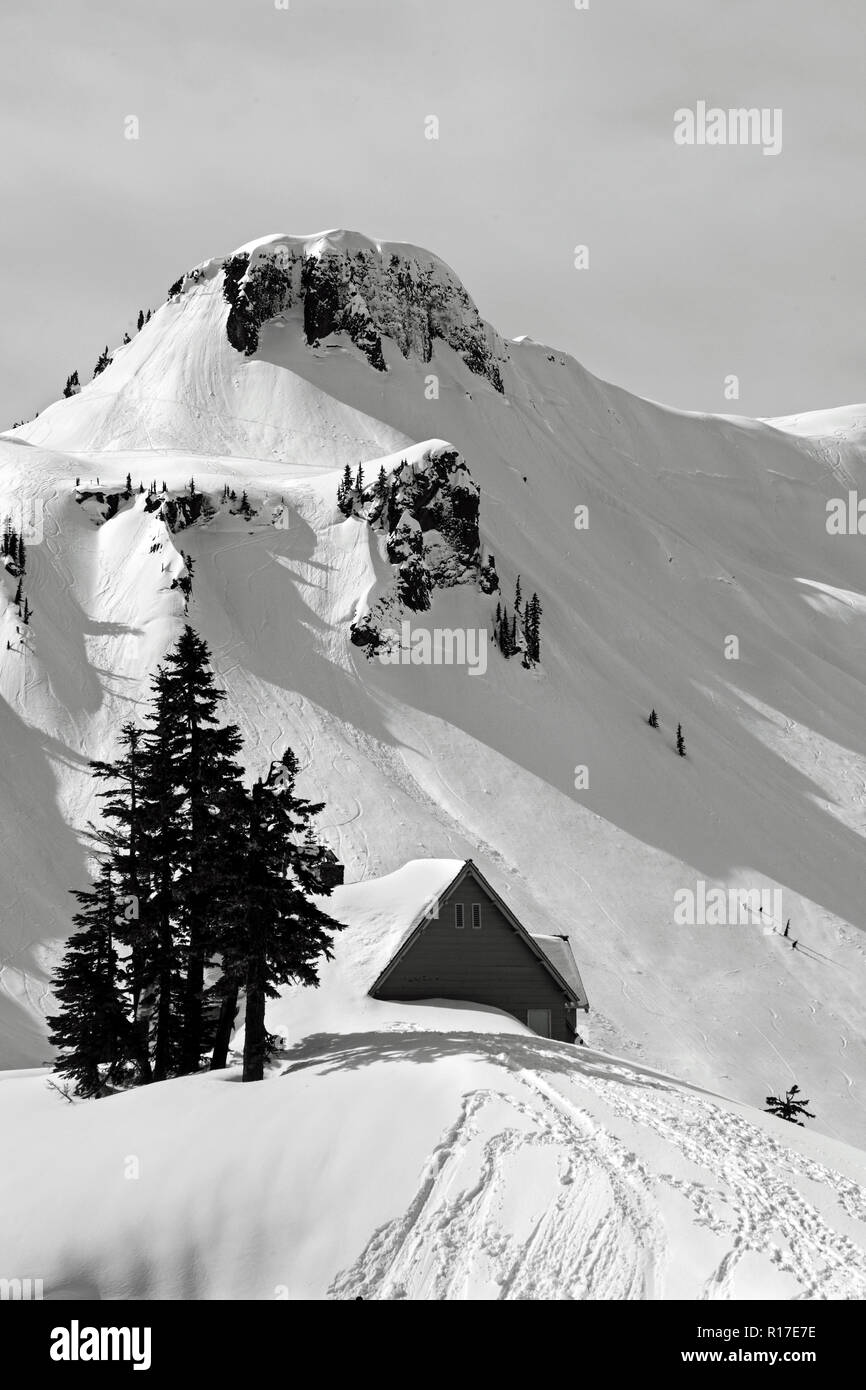 A cabin buried in heavy snow up at Mt. Baker Ski Resort, Washington, USA Stock Photo