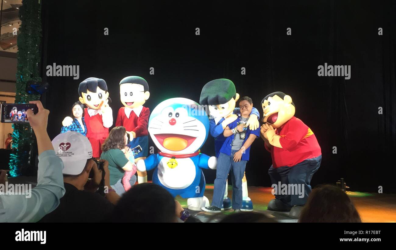 Quezon City, Philippines. 09th Nov, 2018. Characters from popular animes and cartoons from Doraemon, Pokemon, Monster Inc. and Care Bears wowed the kids with autism with their Christmas dance and performances. This Quezon City, Philippines. 09th Nov, 2018. Characters from popular animes and cartoons from Doraemon, Pokemon, Monster Inc. and Care Bears wowed the kids with autism with their Christmas dance and performances. This