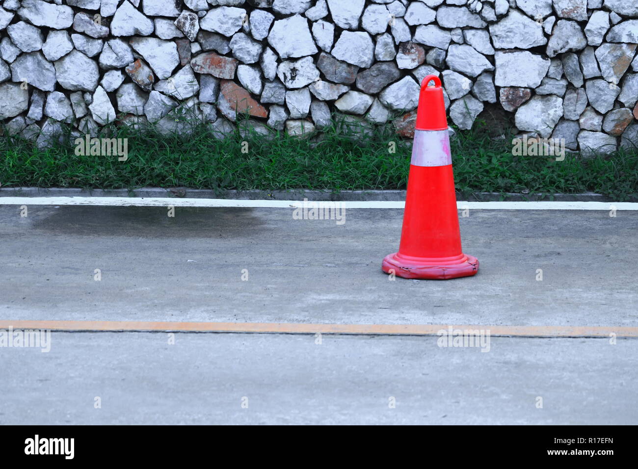Fluorescent orange traffic cone hi-res stock photography and images - Alamy