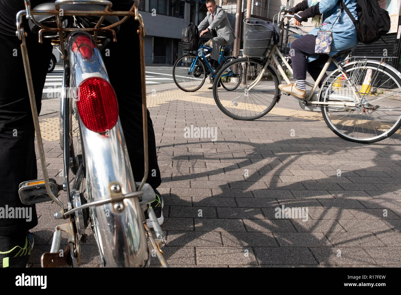 Bicycle riders in Kyoto,Kansai, Japan Stock Photo - Alamy