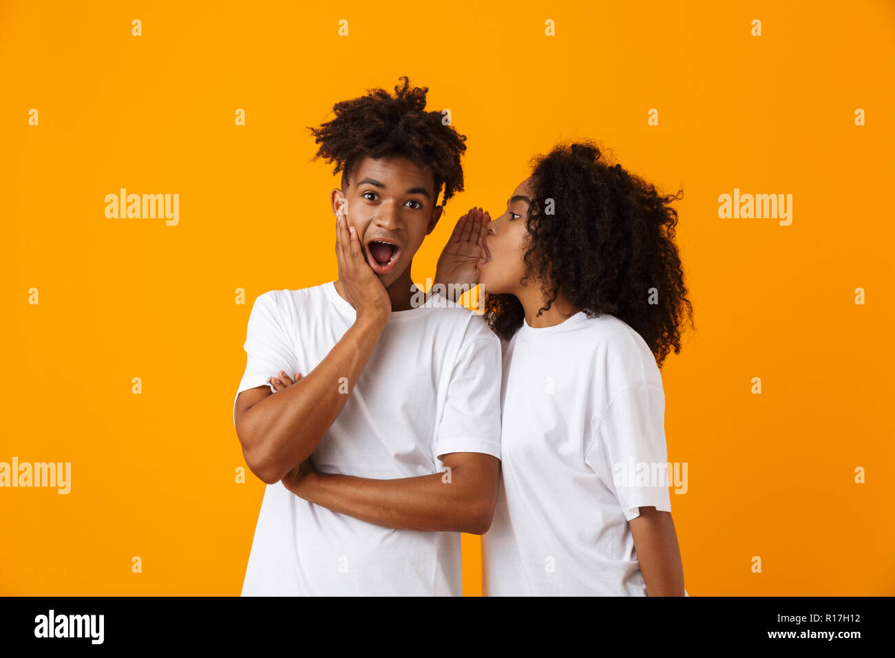 Image Of Emotional Young Cute African Couple Posing Isolated Over