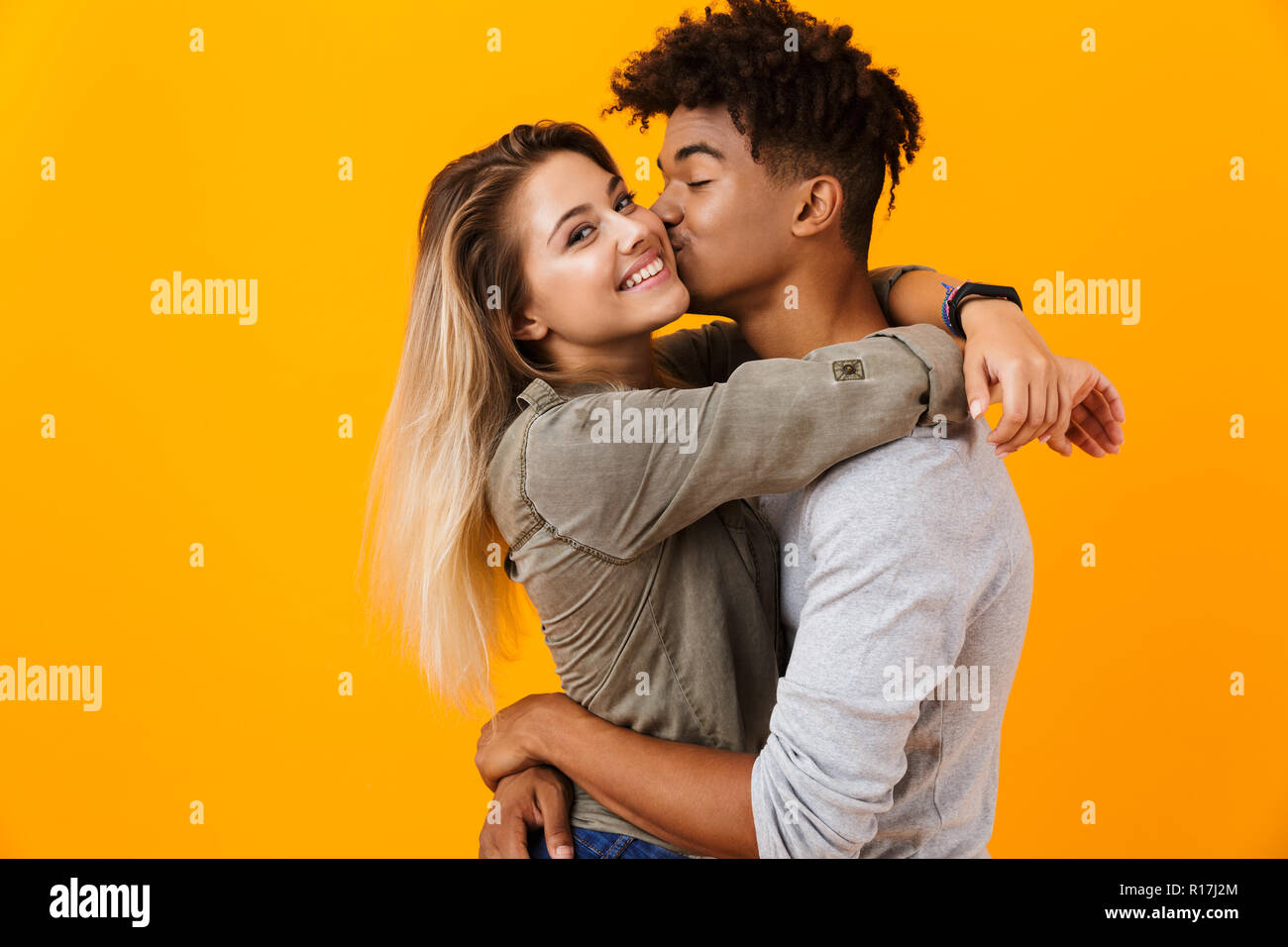 Image Of Happy Cute Young Loving Couple Posing Isolated Over