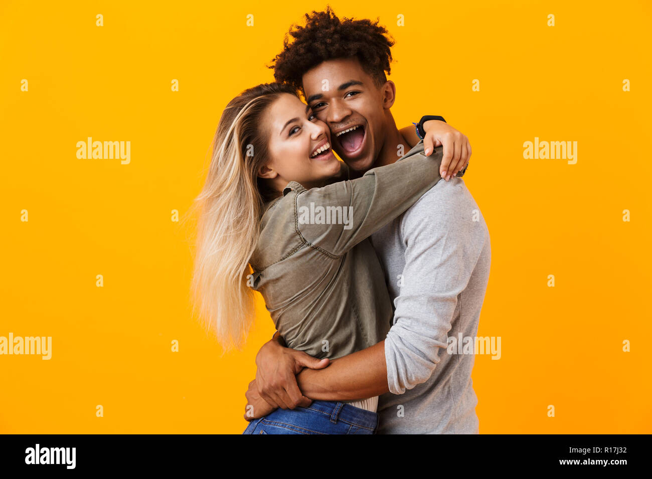 Image Of Happy Cute Young Loving Couple Posing Isolated Over Yellow  Background Hugging Take A Selfie By Camera Showing Peace Gesture. Stock  Photo, Picture and Royalty Free Image. Image 110978862.