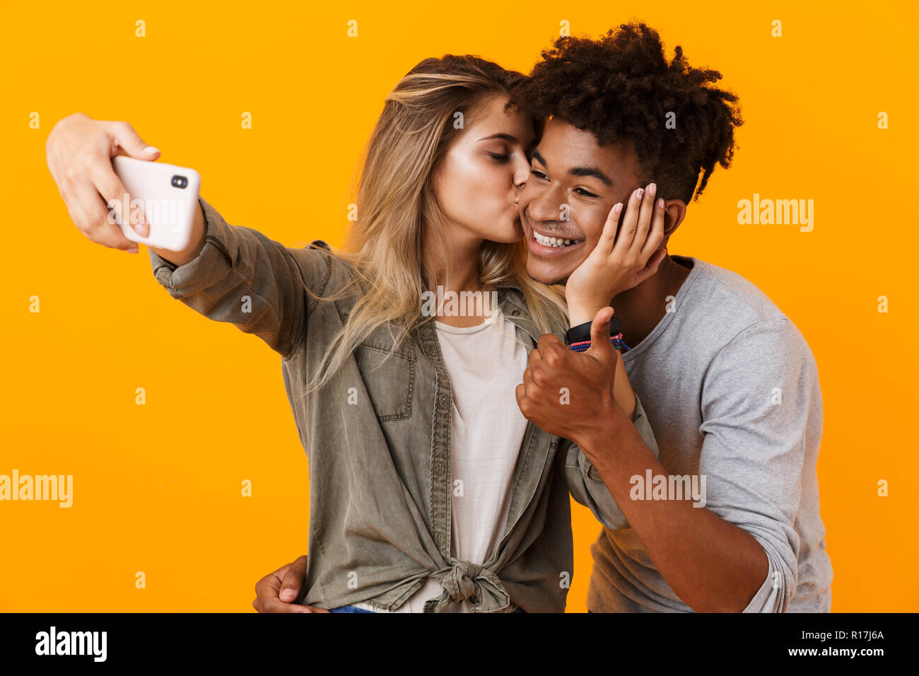 Image Of Happy Cute Young Loving Couple Posing Isolated Over