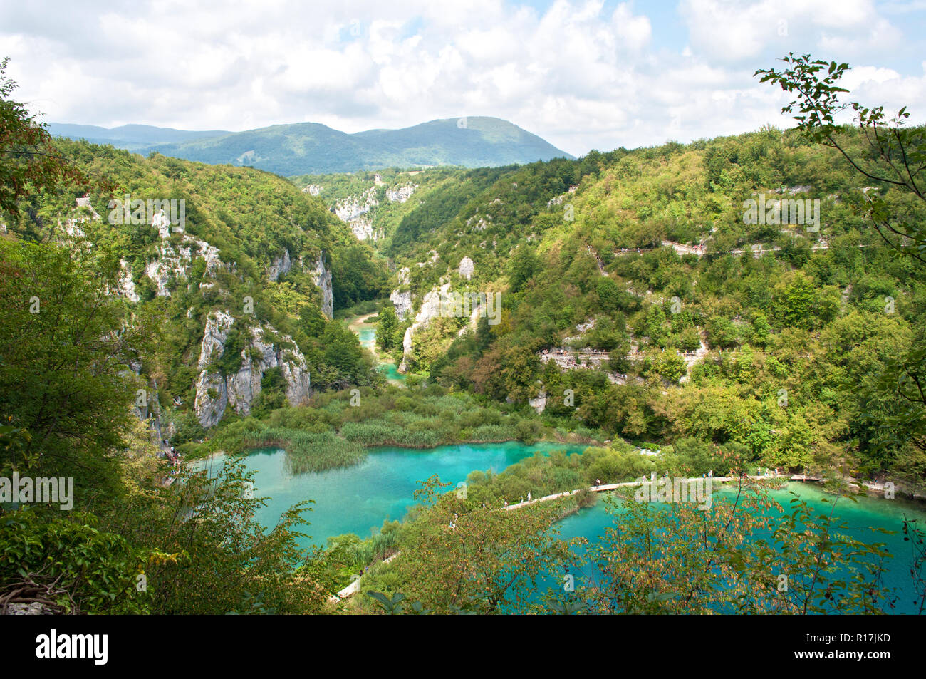 Lower lakes canyon. Hiking path meandering between two lakes with turquoise water. View from above. Plitvice lakes national park, Croatia Stock Photo
