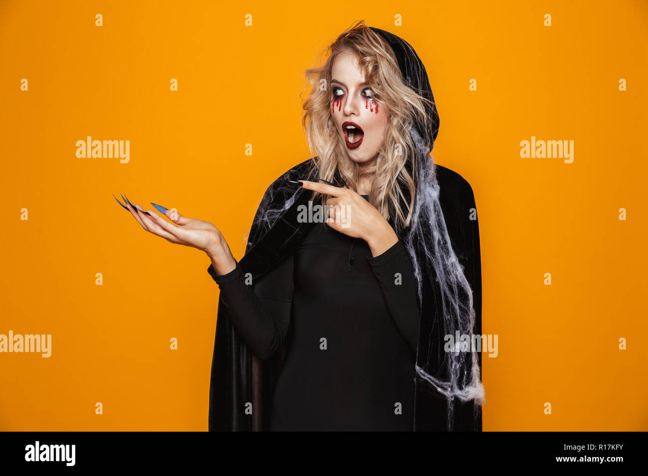 Orange and black dress hi-res stock photography and images - Alamy