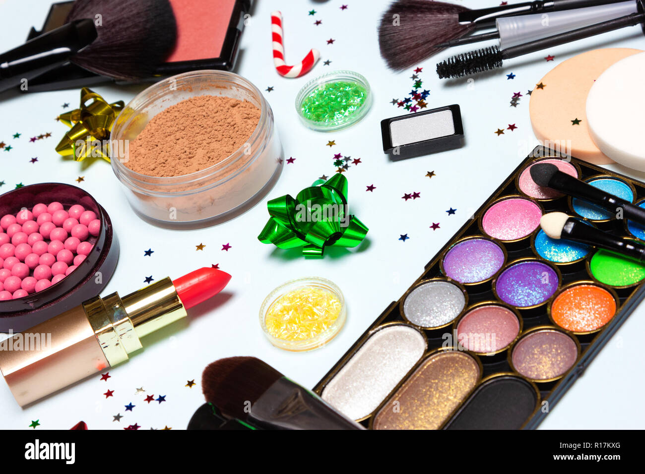 Christmas party glistening makeup. Bright sparkling New Year make up.  Cosmetics and accessories. Close up, selective focus Stock Photo - Alamy