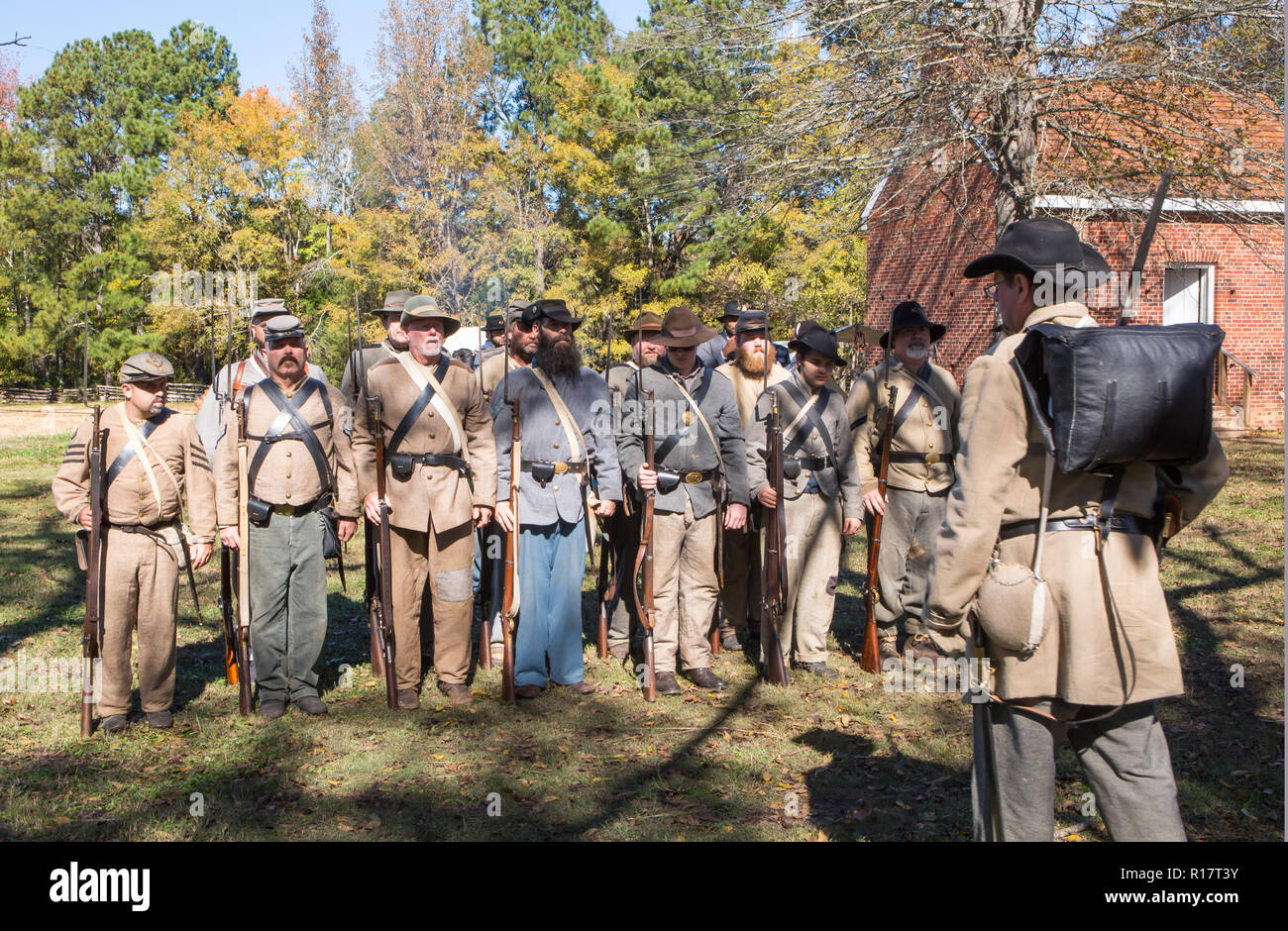 MCCONNELLS, SC (USA) - November 3, 2018: Confederate troops stand at attention during a Civil War battle reenactment at Historic Brattonsville. Stock Photo