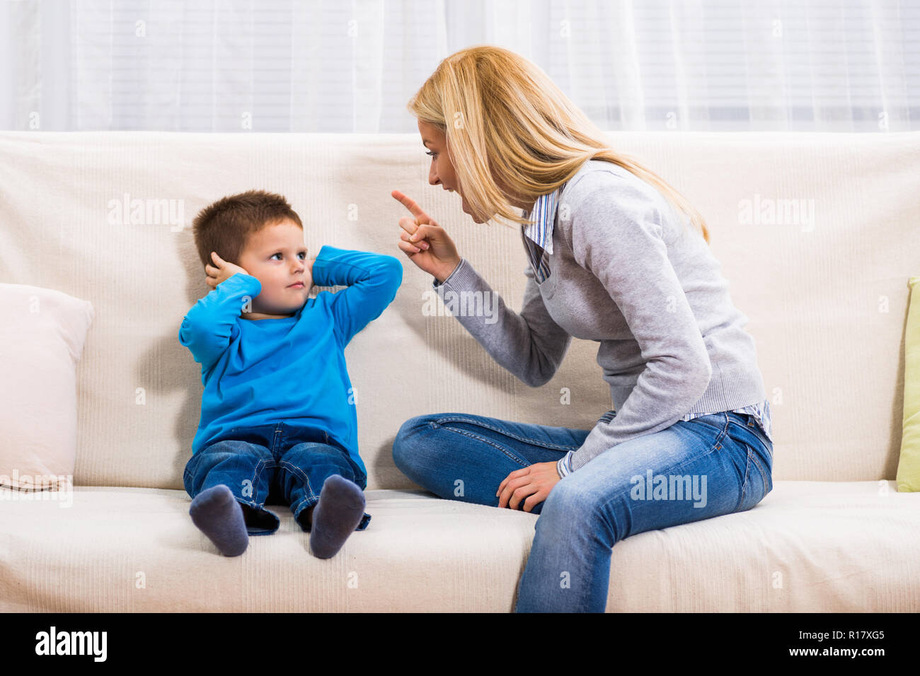 https://c8.alamy.com/comp/R17XG5/angry-mother-is-scolding-at-her-son-R17XG5.jpg