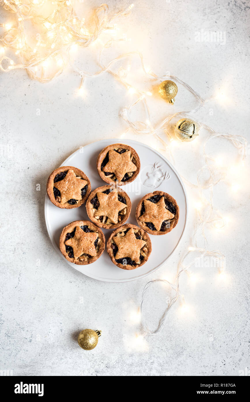 Mince Pies for Christmas on white background with light, copy space ...