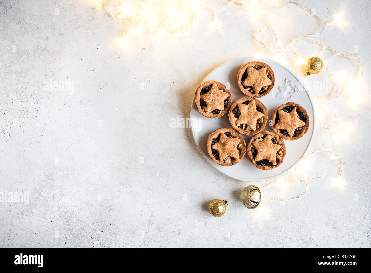 Mince Pies for Christmas on white background with light, copy space ...