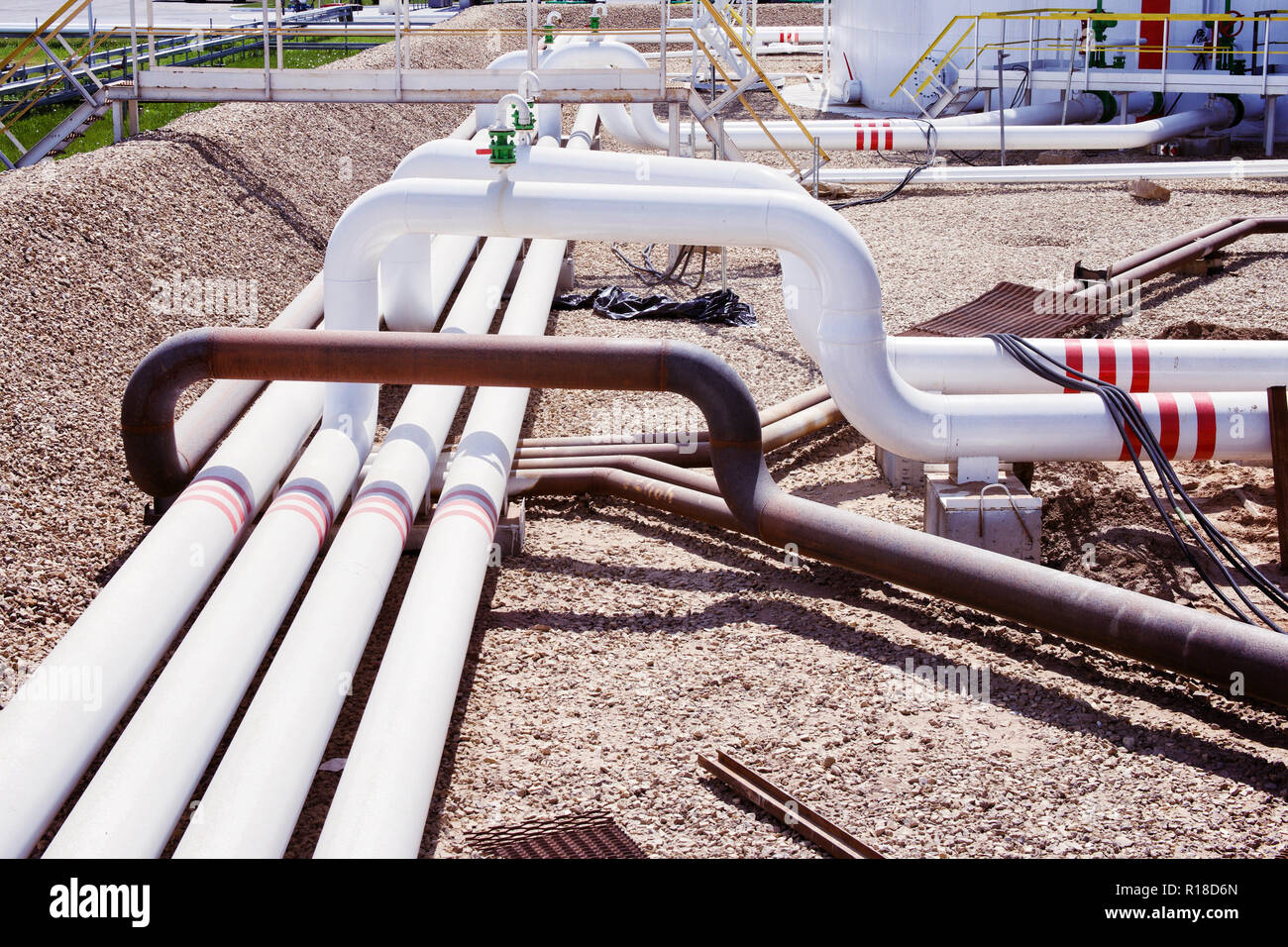 Steel fuel pipes and valves at the oil refinery Stock Photo Alamy