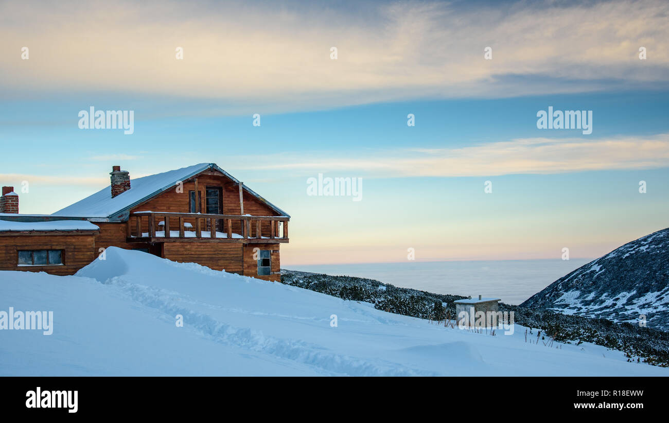 Winter view from Musala peak - the highest point of the Balkan peninsula - frozen landscape, rocky terrain, deep powder snow and beautiful nature Stock Photo