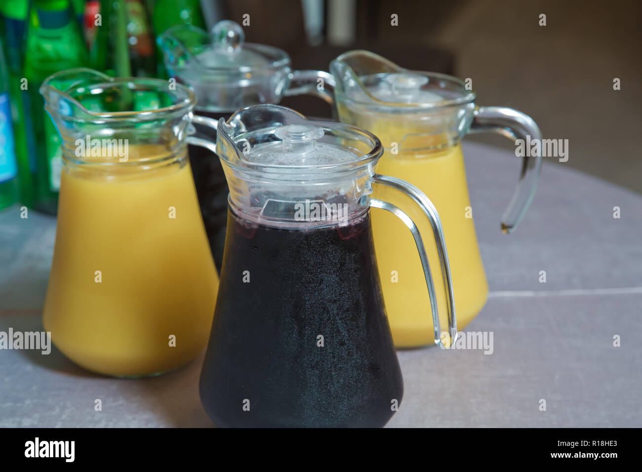 https://c8.alamy.com/comp/R18HE3/yellow-and-red-smoothie-juice-delicious-orange-juice-in-jug-uice-in-heavy-glass-jug-orange-yellow-and-red-glass-pitcher-R18HE3.jpg