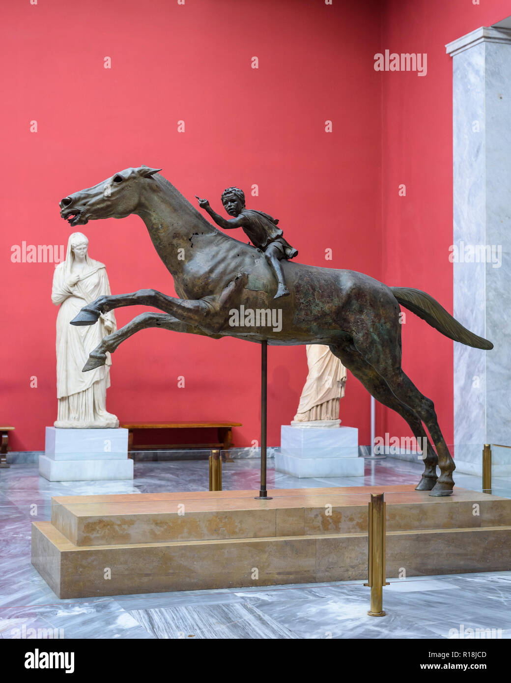 Athens. Greece. The Artemision Jockey, bronze statue of a horse and young jockey, dated ca. 140 B.C. National Archaeological Museum of Athens.  The st Stock Photo