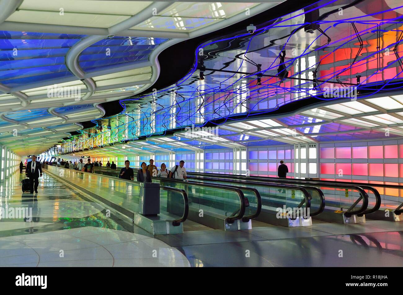 Chicago, Illinois, USA. The colorfully appointed tunnel passageway connecting two United Airlines terminals at O'Hare International Airport. Stock Photo