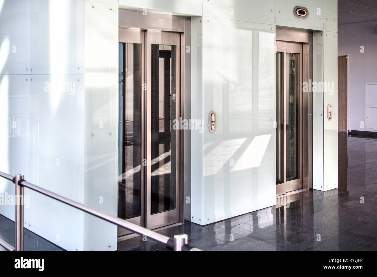Modern Glass Doors Of Elevator In A Modern Commercial Building