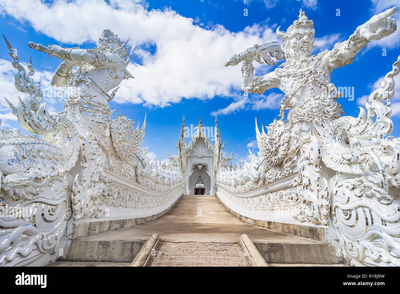 Chiang Rai, Thailand, Asia: Beautiful ornate white temple located in Chiang Rai northern Thailand, a contemporary unconventional Buddhist temple. Stock Photo