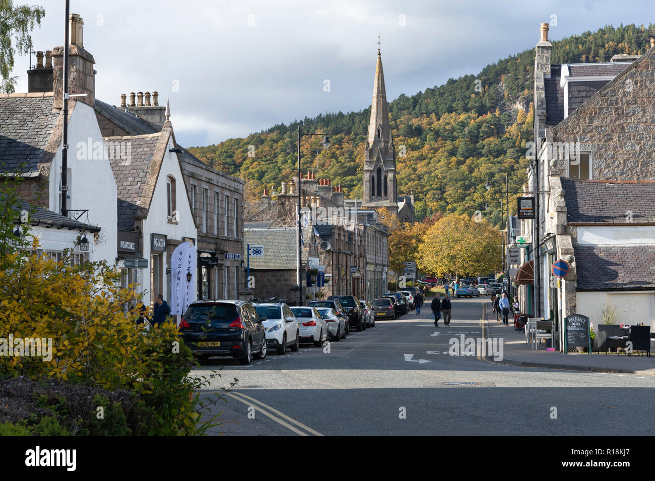 A view Along Bridge Street in Ballater Towards Glenmuick Church on an Afternoon in Autumn Stock Photo