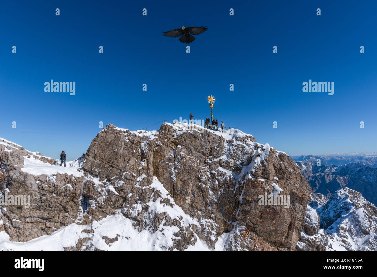 Summit cross, Zugsptize, highest peak, Garmisch-Partenkirchen, Wetterstein Gebirge or Wetterstein Mountains, the Alps, Bavaria, Germany, Europe Stock Photo