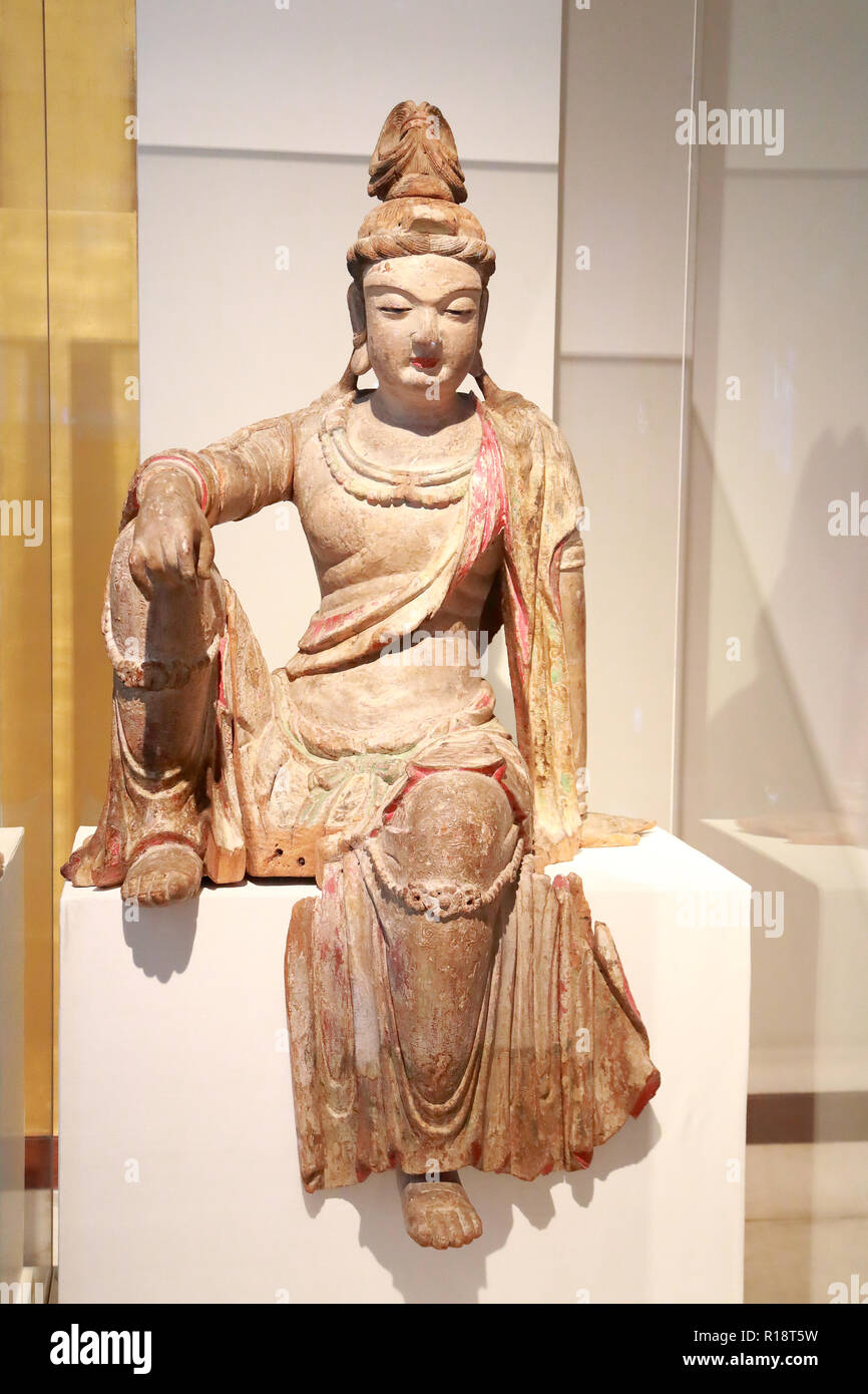 Wooden figure of Guanyin at the British Museum, London, UK Stock Photo