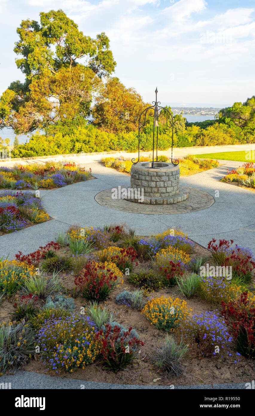 Rotary wishing well set in a garden of wild flowers Kings Park Perth Western Australia Stock Photo