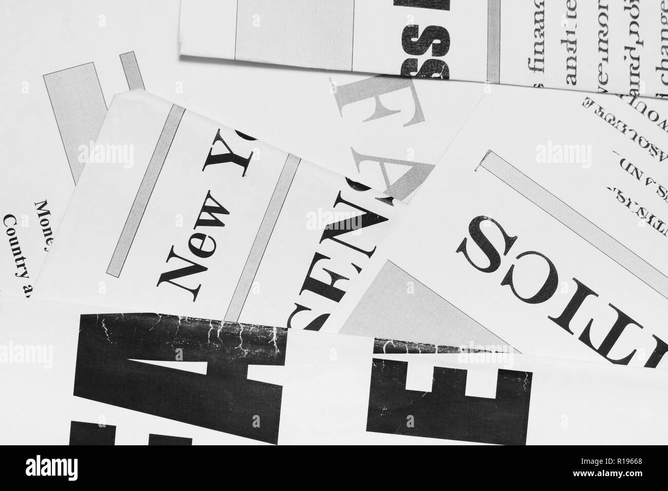Business news on pages of journals and magazines. Newspapers with headlines and articles scattered on horizontal surface, top view background texture Stock Photo