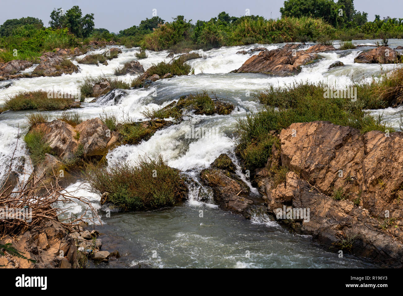Don Khone, Laos - April 23, 2018: Rapids over the Mekong river on the Four Thousand Islands zone near the border between Laos and Cambodia Stock Photo
