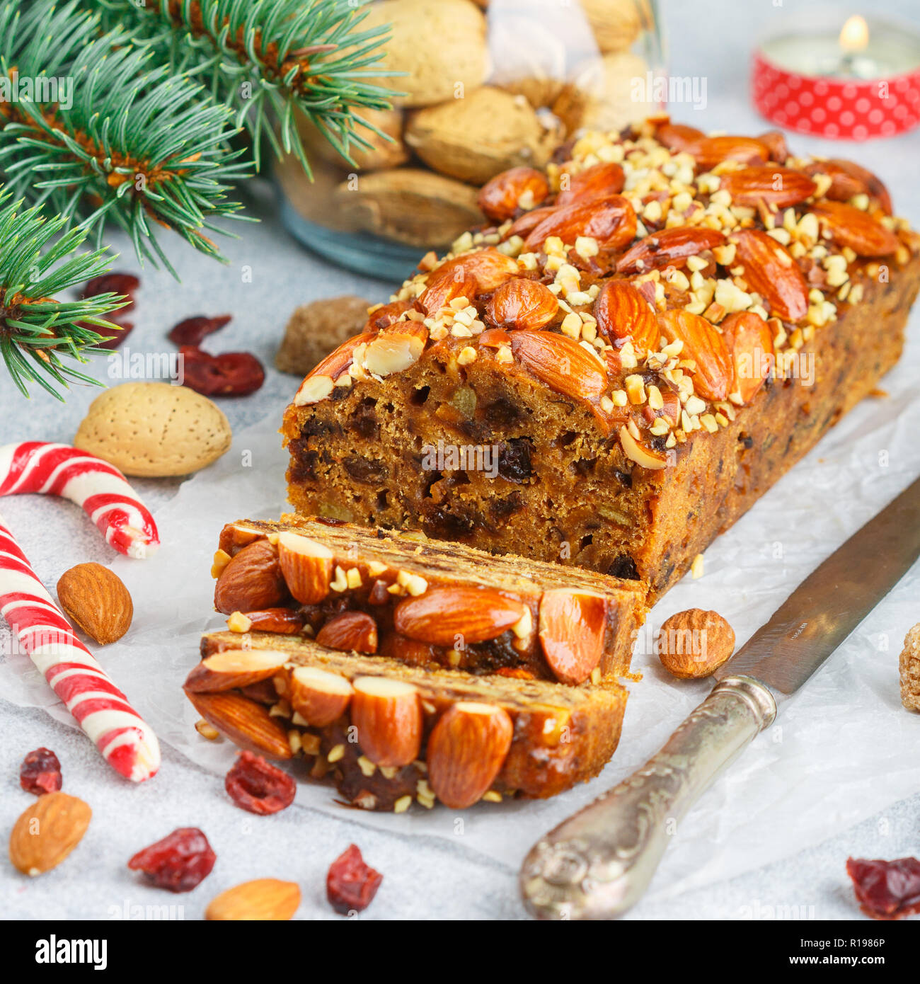 Fruitcake. Traditional Christmas cake with almonds, dried cranberries