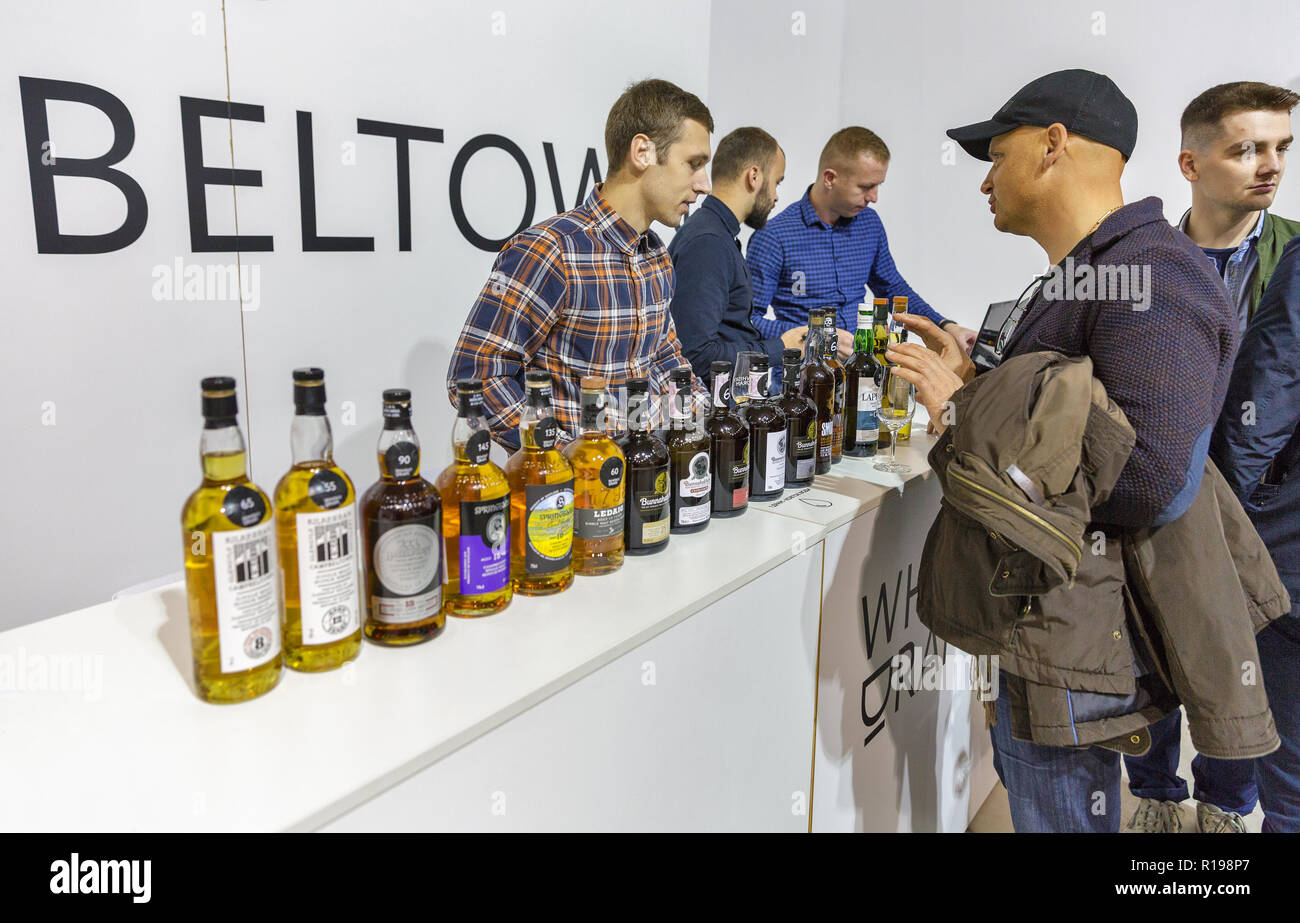 KIEV, UKRAINE - OCTOBER 20, 2018: People visit Bunnahabhain Scottish single malt whisky booth at 4th Ukrainian Whisky Dram Festival organized by Good  Stock Photo