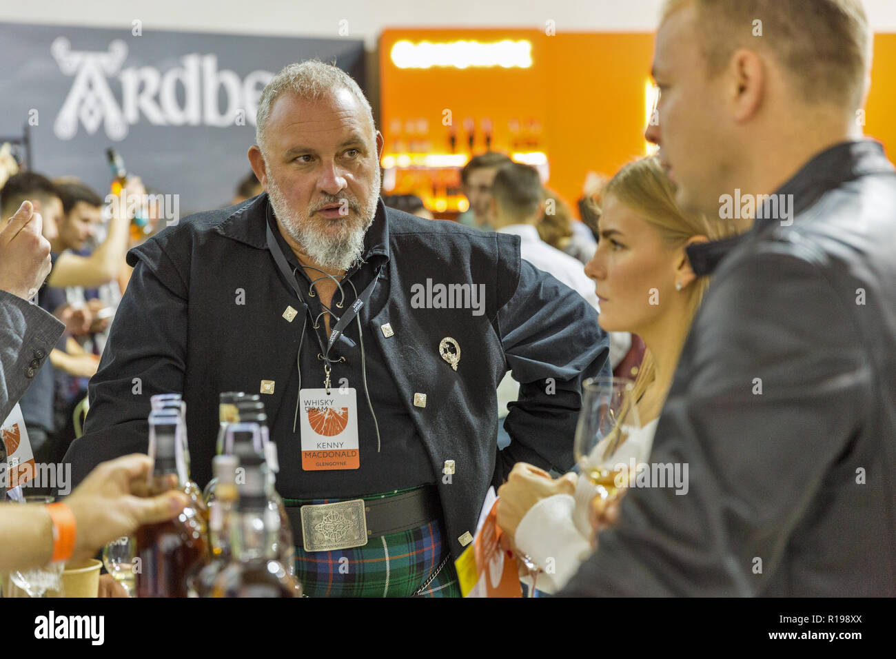 KIEV, UKRAINE - OCTOBER 20, 2018: Kenny Macdonald welcomes visitors at Glengoyne Scottish single malt whisky booth at 4th Ukrainian Whisky Dram Festiv Stock Photo