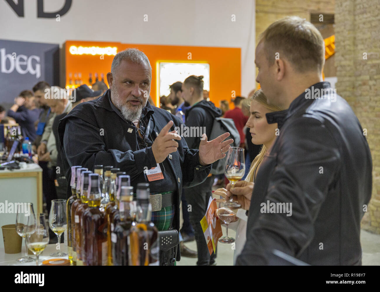 KIEV, UKRAINE - OCTOBER 20, 2018: Kenny Macdonald welcomes visitors at Glengoyne Scottish single malt whisky booth at 4th Ukrainian Whisky Dram Festiv Stock Photo