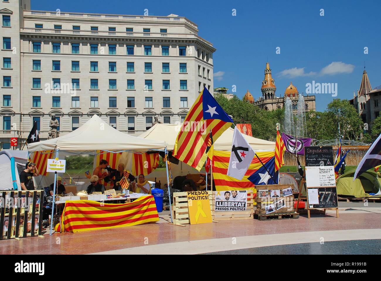 Campaigners for the Llibertat Presos Politics (Free Political Prisoners) movement campaign in Placa Catalunya in Barcelona, Spain on April 17, 2018. Stock Photo
