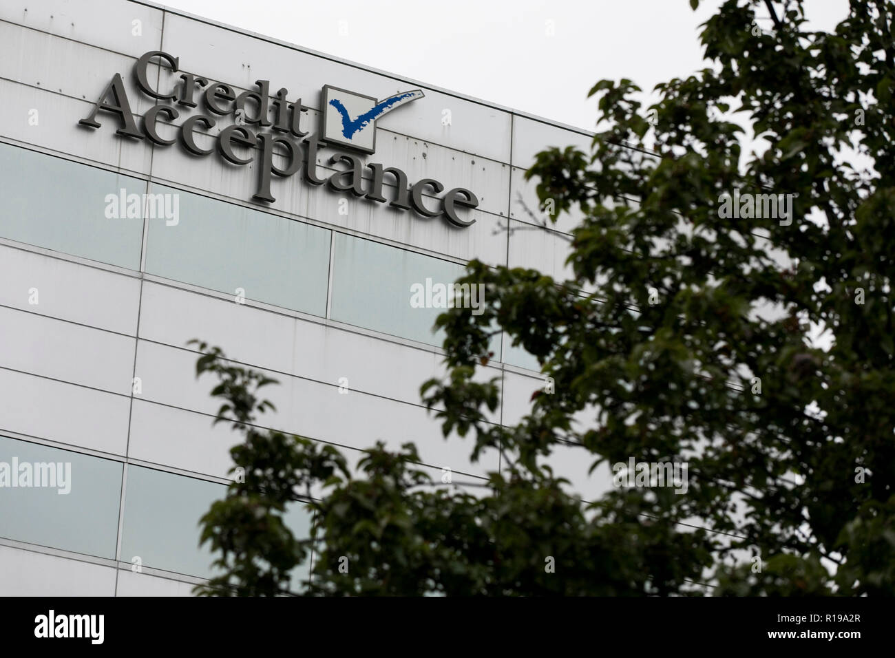 A logo sign outside of the headquarters of the Credit Acceptance
