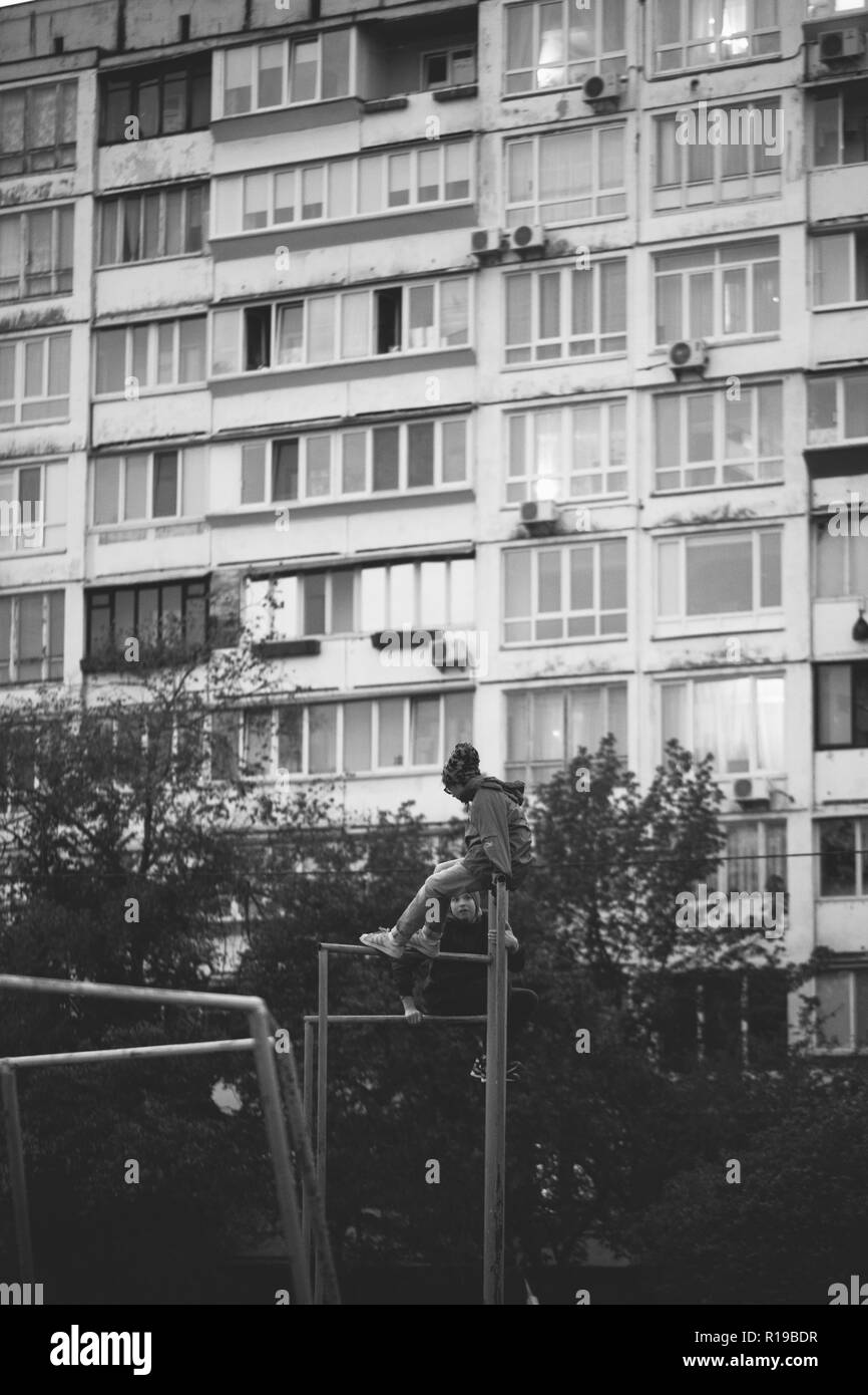 Ghetto architecture the collapse of the Soviet Union. Echo of the USSR. Country high-rise houses in the evening in Obolon district in the city of Kiev Stock Photo