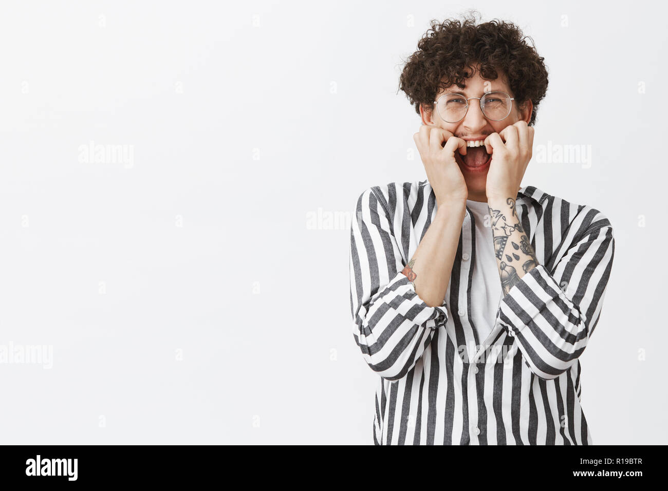 Waist Up Shot Of Timid And Insecure Funny Jewish Guy With