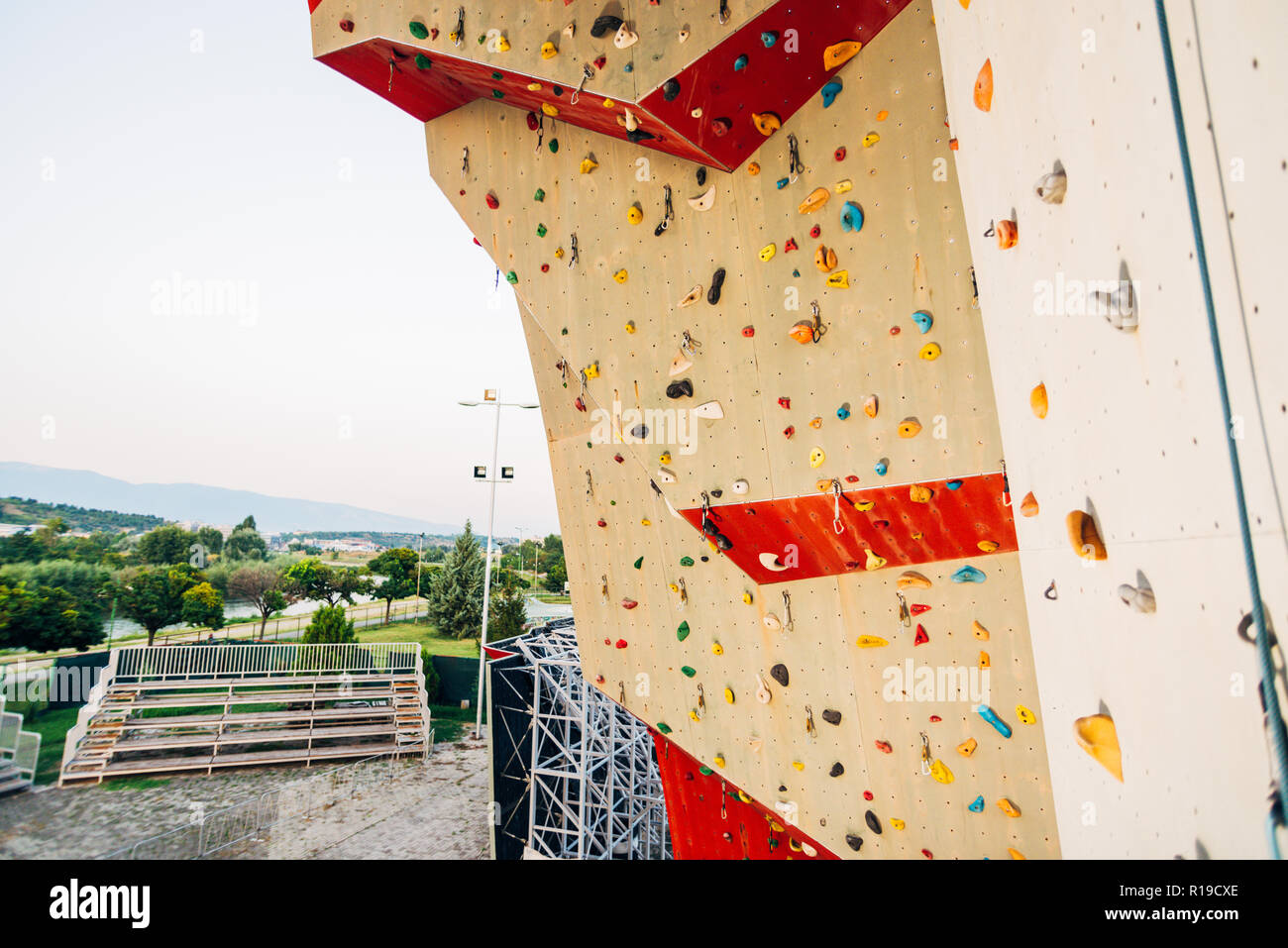 Outdoor rock climbing wall in a sport facility Stock Photo - Alamy