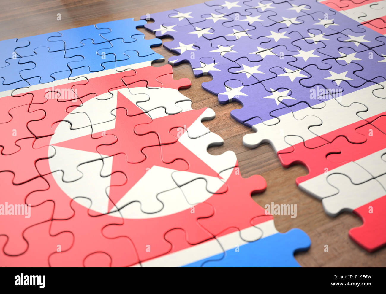 Two nations joining in a puzzle game that represents union, peace, commerce, social and human agreement. Stock Photo