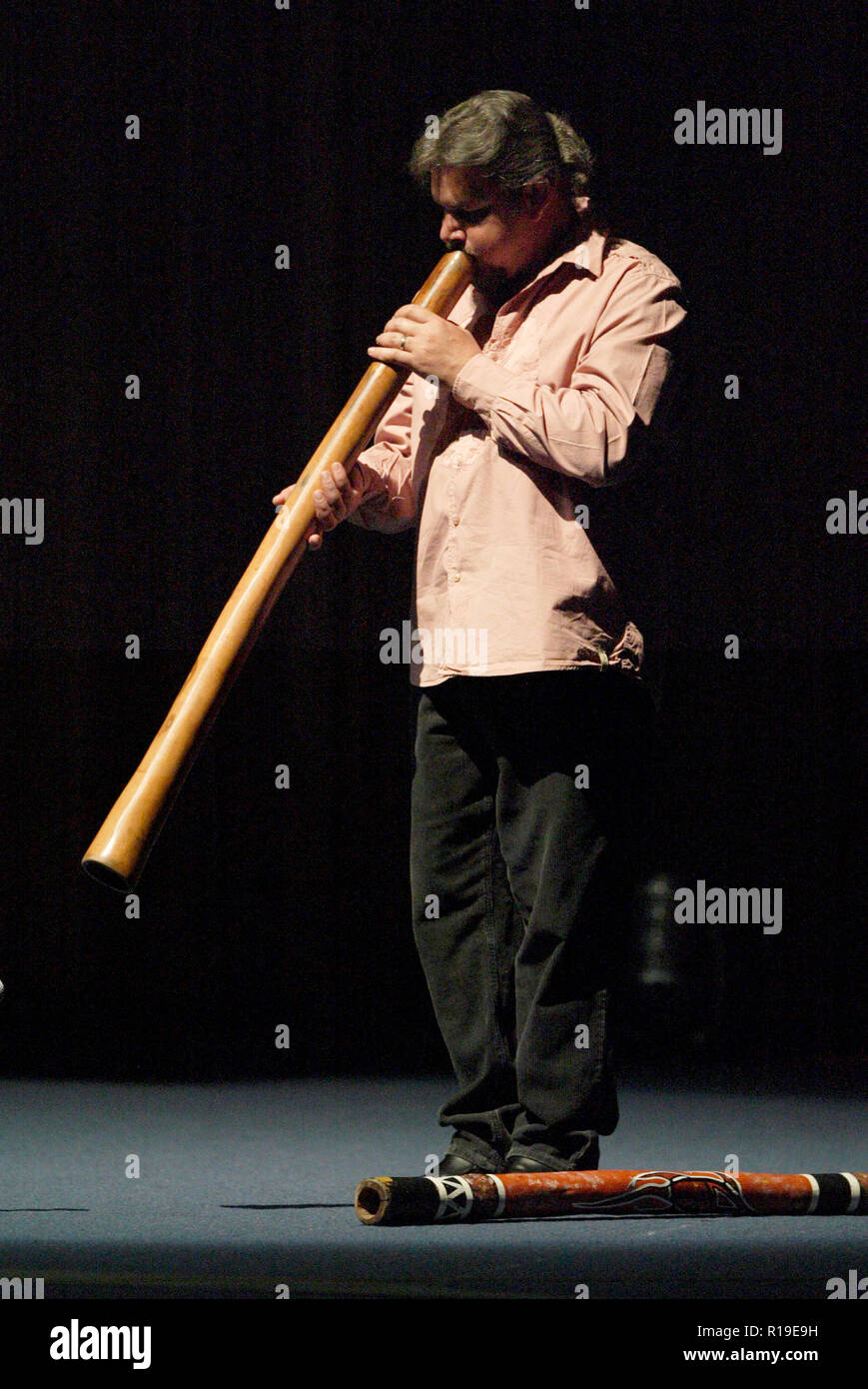 Matthew Doyle, didgeridoo player Tokiko Kato, Japanese singer and Goodwill Ambassador for the United Nations Environment Programme, performing live in concert at Sydney Congress Hall. Sydney, Australia. 20.08.08. Stock Photo