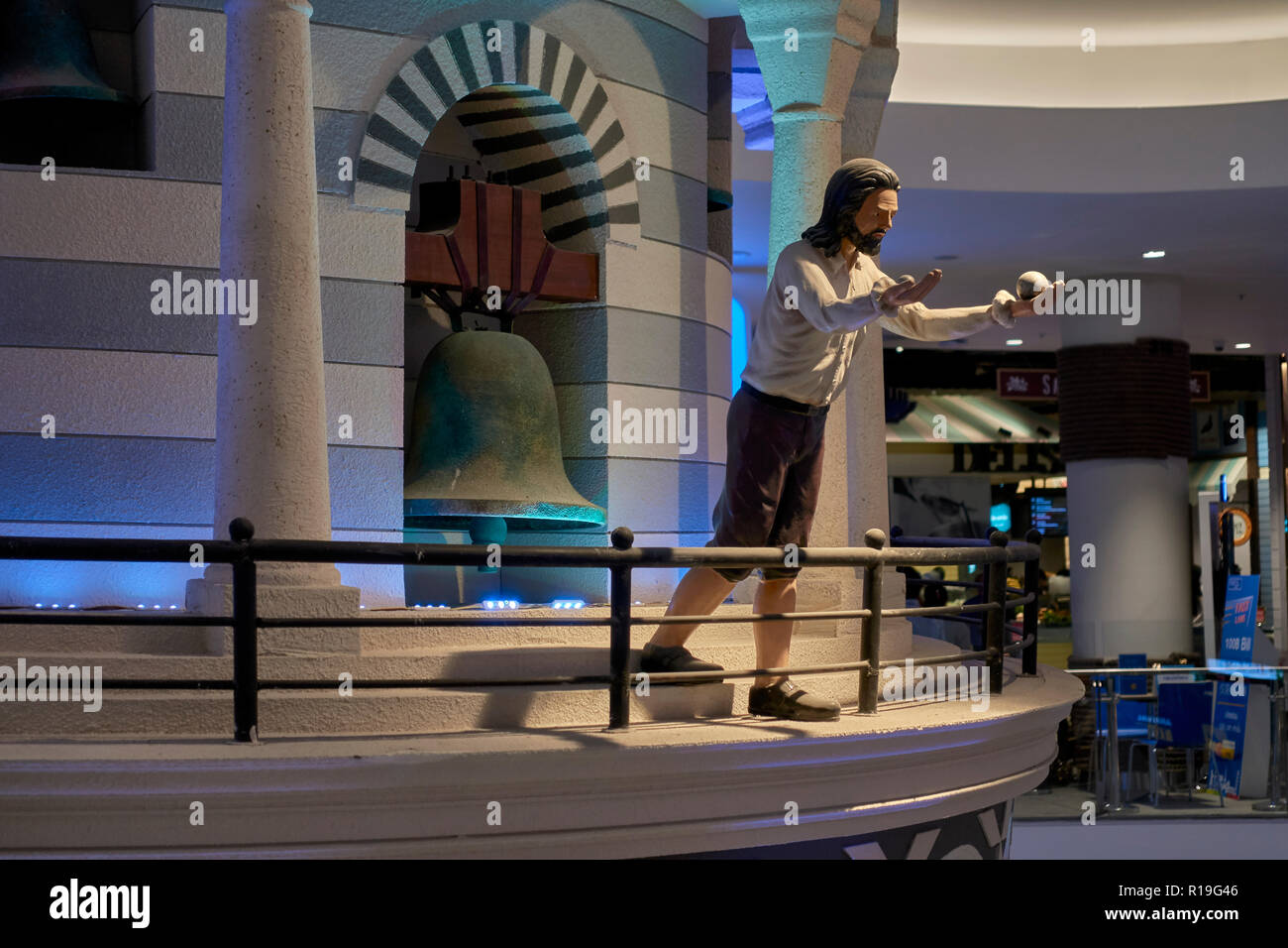 Statue of Galileo at the tower of Pisa who is said to have dropped two
