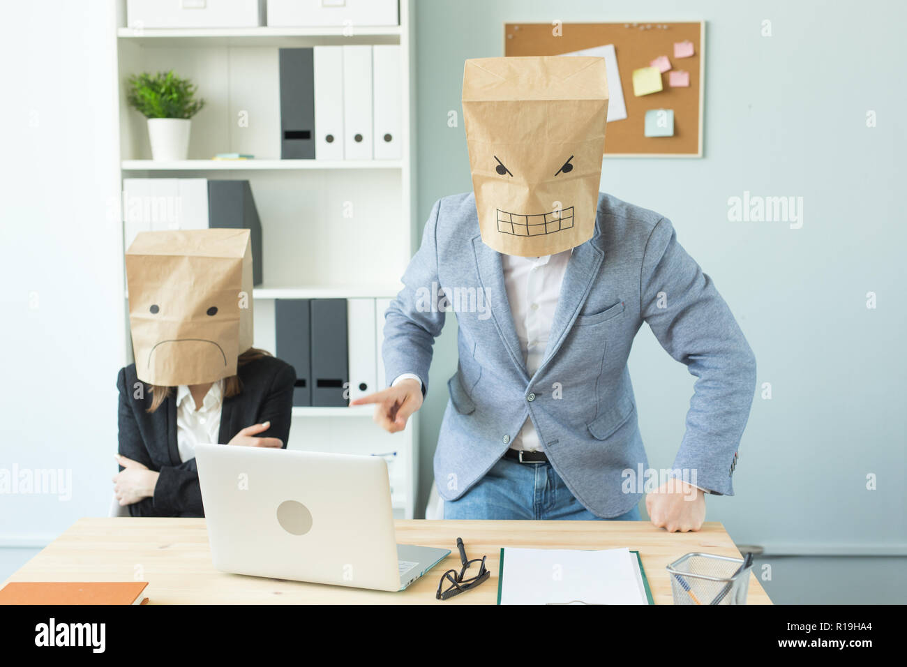 Business, emotions and people concept - Two angry and exhausted workers ...