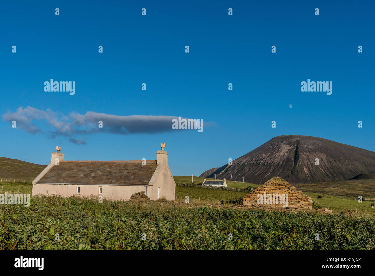 view of Ward Hill, with cottage, Hoy, Orkney Stock Photo