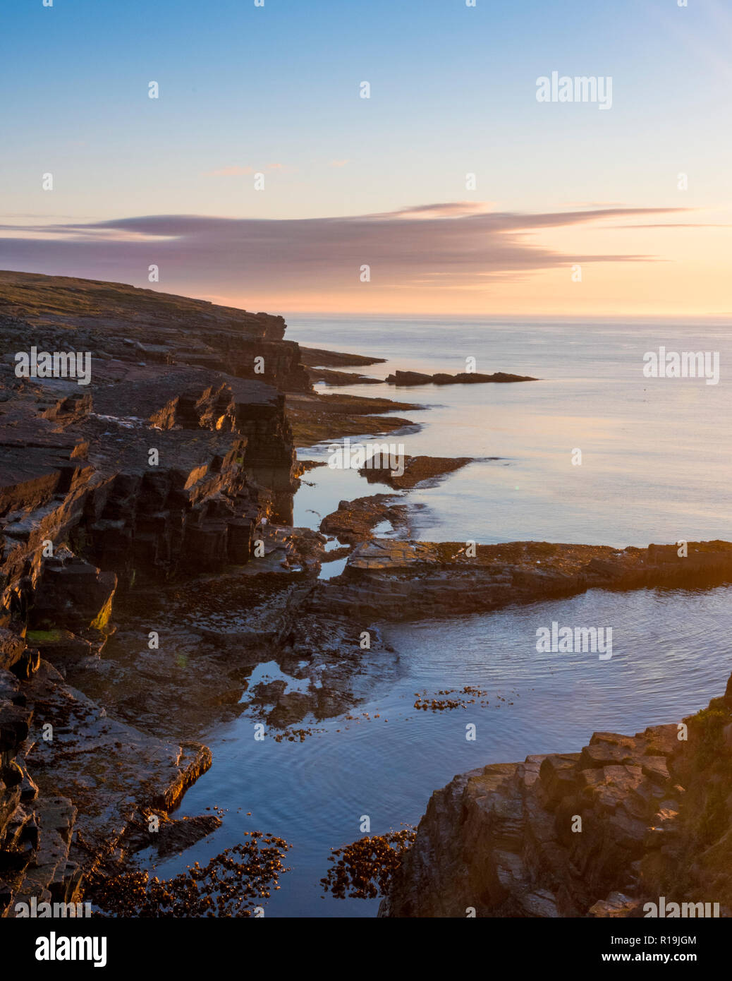 Cliffs at Deerness Nature reserve , Mainland Orkney at sunrise. Stock Photo