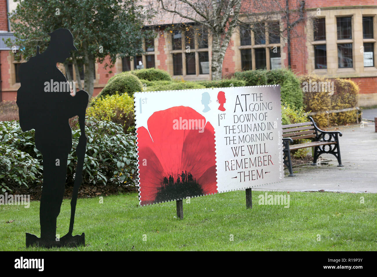 Castleton, Rochdale, UK. 10th Nov, 2018. A silhouette soldier and 'We will remember' poster displayed in  Castleton, Rochdale, 10th November 2018 (C)Barbara Cook/Alamy Live News Stock Photo