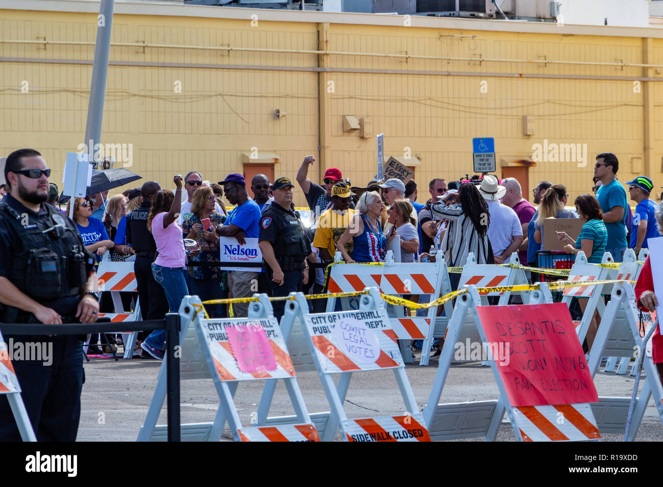 Lauderhill, Florida, USA. 10th Nov, 2018. Vote counting protest in front of Broward County Supervisor of Elections Brenda Snipes' office. The protest began over controversy surrounding the results of the 2018 midterm elections for Florida Governor and Florida Senator. Holly Guerrio/Alamy Live News Stock Photo