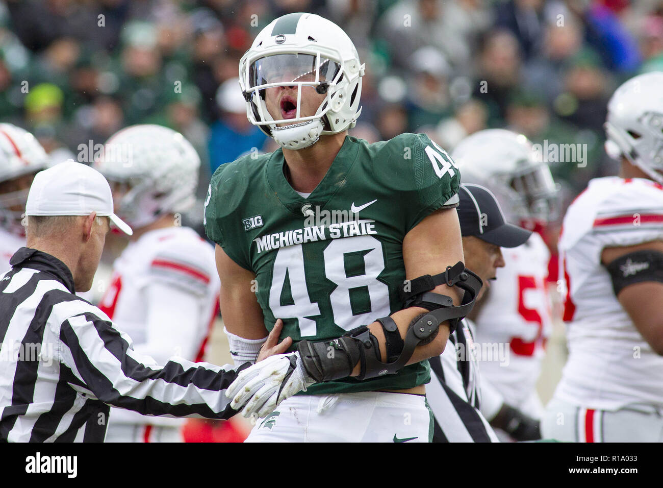 East Lansing, Michigan, USA. 10th Nov, 2018. Michigan State defensive end  KENNY WILLEKES (48) celebrates after making a tackle during the first half  against Ohio State at Spartan Stadium. Credit: Scott Mapes/ZUMA