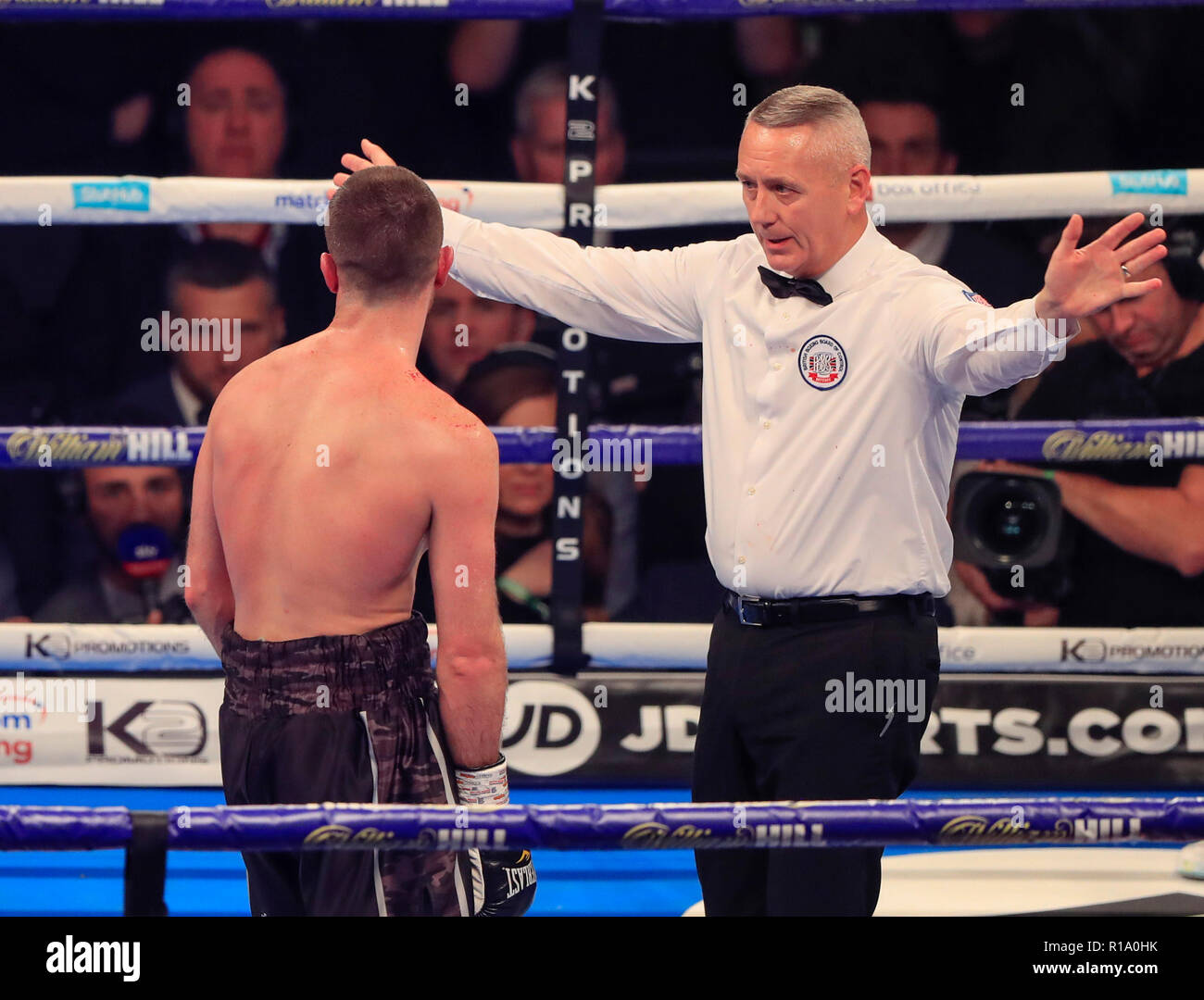 Manchester Arena, Manchester, UK. 10th Nov, 2018. Boxing, WBC, WBA, WBO, IBF and Ring Magazine World Cruiserweight fight, Oleksandr Usyk versus Tony Bellew; Scotty Cardle is stopped by the referee in the third round of his fight with Ricky Burns Credit: Action Plus Sports/Alamy Live News Stock Photo