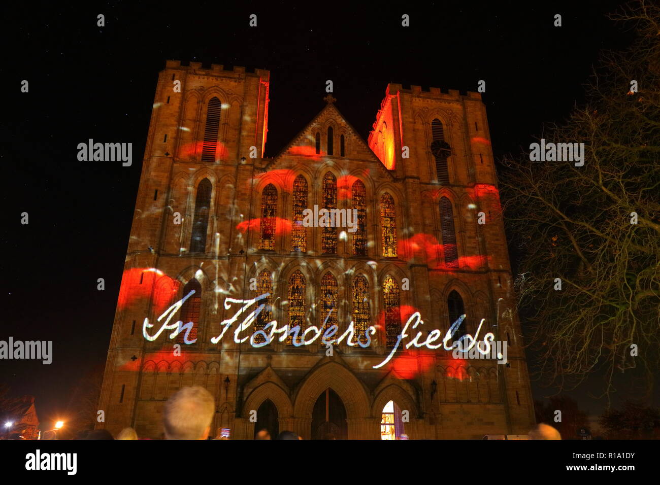 Ripon, North Yorkshire,10th November 2018. Ripon Cathedral lit up by animated projection, which shows photos from WW1 and lists of soldiers who lost their lives during the war. Credit: Yorkshire Pics/Alamy Live News Stock Photo