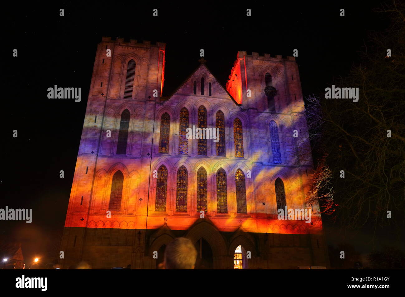 Ripon, North Yorkshire,10th November 2018. Ripon Cathedral lit up by animated projection, which shows photos from WW1 and lists of men who lost their lives during the war. Credit: Yorkshire Pics/Alamy Live News Stock Photo